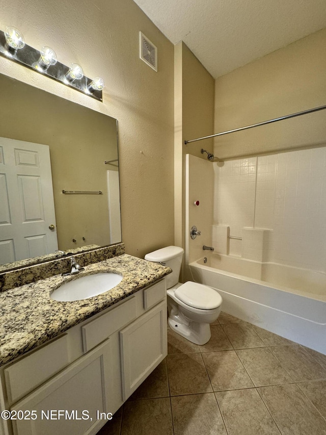 9626 Belda Way Unit 7, Jacksonville, FL 32257 - bathroom with vanity, tile patterned floors, shower / tub combination, and a textured ceiling