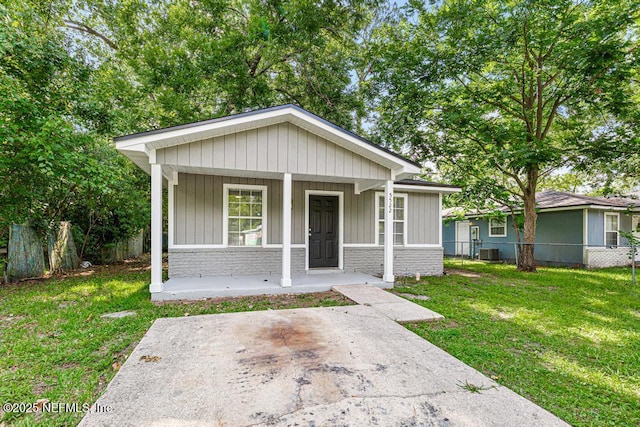 5522 Paris Ave, Jacksonville, FL 32209 - bungalow-style house with covered porch and brick siding