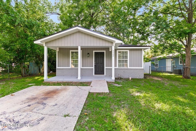 5522 Paris Ave, Jacksonville, FL 32209 - bungalow-style house featuring brick siding and covered porch