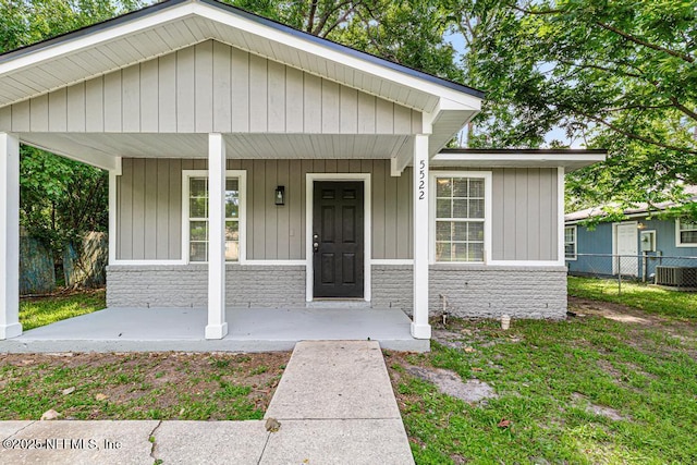 5522 Paris Ave, Jacksonville, FL 32209 - view of front of property with brick siding and a porch