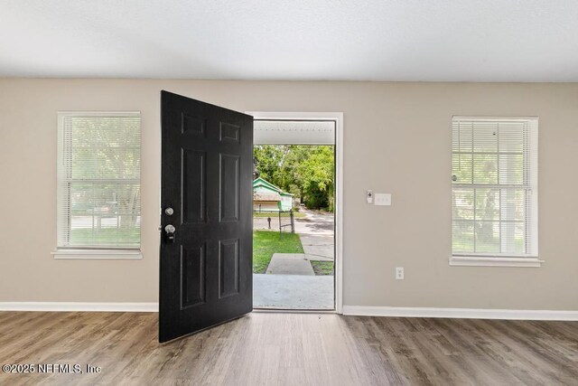 5522 Paris Ave, Jacksonville, FL 32209 - foyer with wood finished floors and healthy amount of natural light