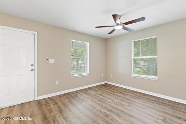 5522 Paris Ave, Jacksonville, FL 32209 - spare room with a ceiling fan and wood finished floors