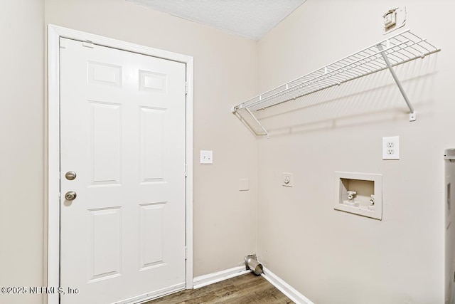 5522 Paris Ave, Jacksonville, FL 32209 - laundry area featuring electric dryer hookup, wood finished floors, and hookup for a washing machine