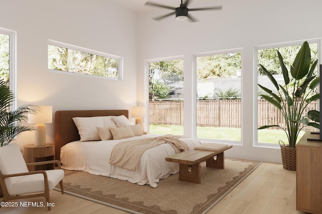 30 Bermuda Run Way, Saint Augustine Beach, FL 32080 - bedroom featuring multiple windows, a high ceiling, and wood finished floors