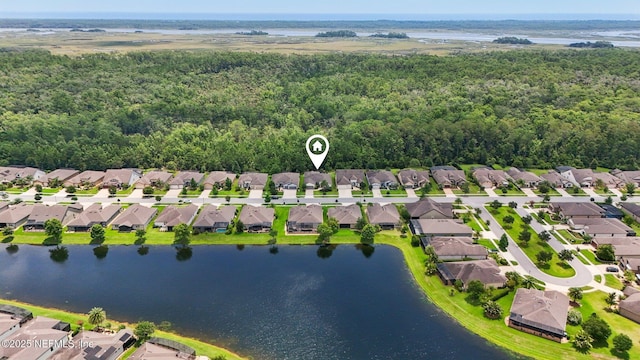 435 Tree Side Ln, Ponte Vedra, FL 32081 - aerial view of residential area featuring a nearby body of water and a heavily wooded area