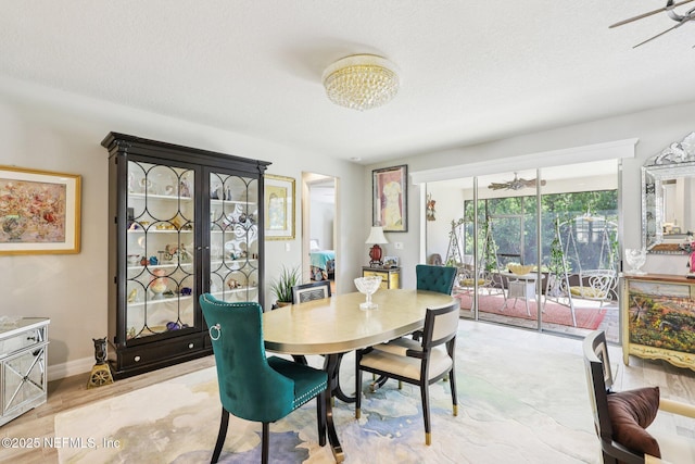 435 Tree Side Ln, Ponte Vedra, FL 32081 - dining room featuring ceiling fan and a textured ceiling