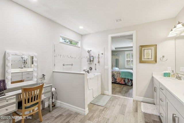 435 Tree Side Ln, Ponte Vedra, FL 32081 - full bathroom featuring vanity, wood finished floors, and healthy amount of natural light