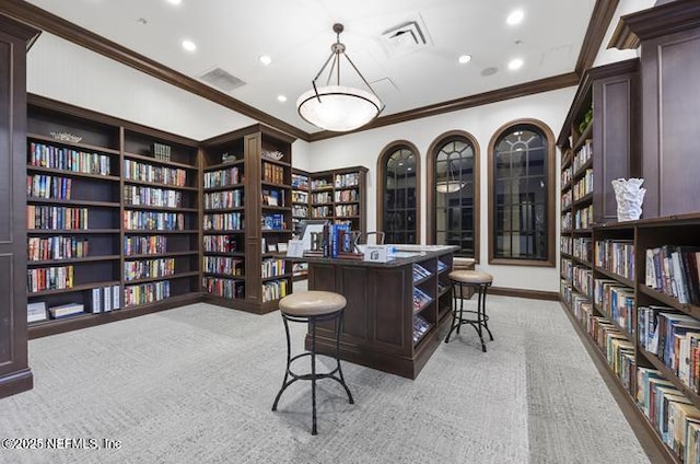 435 Tree Side Ln, Ponte Vedra, FL 32081 - home office with wall of books, ornamental molding, light colored carpet, and recessed lighting