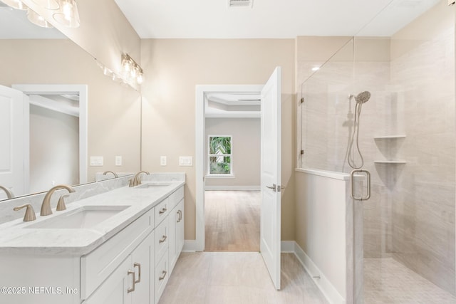 6334 Salado Rd, Saint Augustine, FL 32080 - bathroom featuring double vanity and a shower stall
