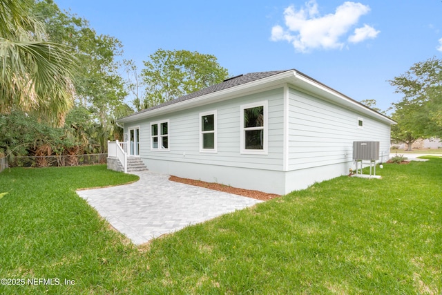 6334 Salado Rd, Saint Augustine, FL 32080 - rear view of property with a lawn and a patio area