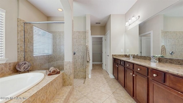 1911 Salt Creek Dr, Fleming Island, FL 32003 - full bath with a bath, vanity, tile patterned flooring, and tiled shower