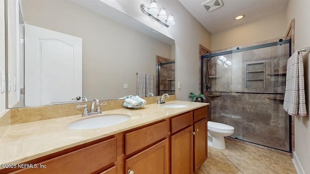 1911 Salt Creek Dr, Fleming Island, FL 32003 - full bathroom with double vanity, tile patterned flooring, and a shower stall