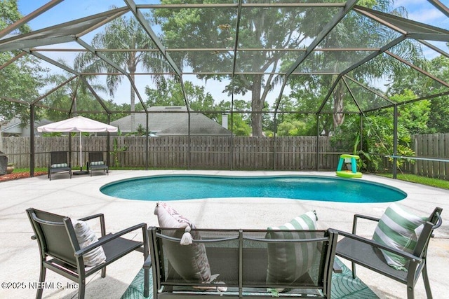 2346 Fairfield Ct, Fleming Island, FL 32003 - view of pool with a patio, a fenced backyard, and a lanai