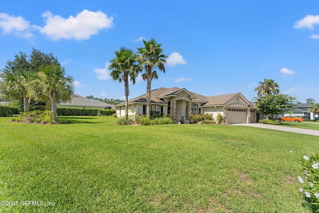 33114 Prairie Parke Pl, Fernandina Beach, FL 32034 - ranch-style home with an attached garage, driveway, and a front lawn