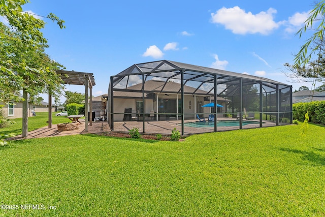 33114 Prairie Parke Pl, Fernandina Beach, FL 32034 - back of house featuring a patio, a yard, an outdoor pool, and a lanai