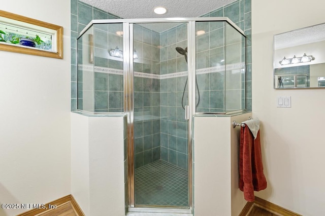 6672 Crooked Creek Ln, Saint Augustine, FL 32095 - full bathroom featuring a stall shower and a textured ceiling
