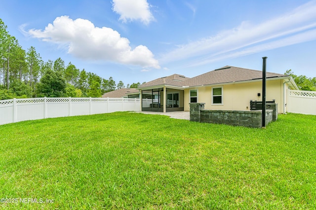 141 Balmoral Castle Dr, Saint Johns, FL 32259 - back of house featuring a sunroom, a fenced backyard, stucco siding, a patio, and a shingled roof