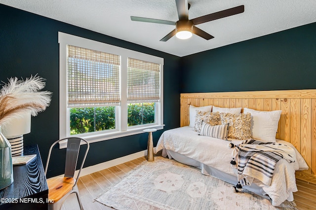 141 Balmoral Castle Dr, Saint Johns, FL 32259 - bedroom featuring wood finished floors, a ceiling fan, and a textured ceiling