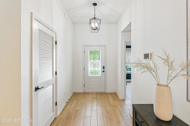 141 Balmoral Castle Dr, Saint Johns, FL 32259 - entrance foyer featuring light wood-style floors and a chandelier