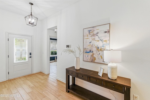 141 Balmoral Castle Dr, Saint Johns, FL 32259 - entryway featuring a chandelier and light wood-style floors