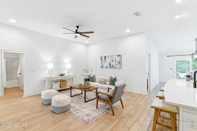 141 Balmoral Castle Dr, Saint Johns, FL 32259 - living room with light wood finished floors, ceiling fan, recessed lighting, and vaulted ceiling