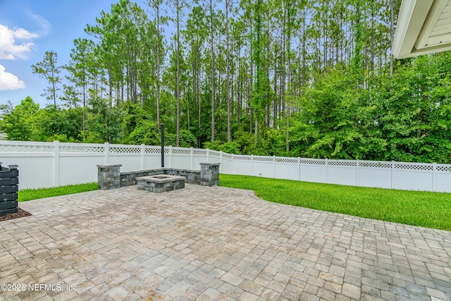 141 Balmoral Castle Dr, Saint Johns, FL 32259 - fenced backyard with a patio area and a fire pit