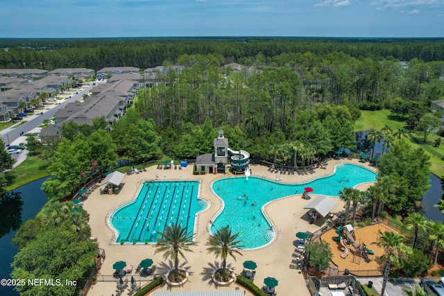 141 Balmoral Castle Dr, Saint Johns, FL 32259 - community pool featuring a view of trees and a water slide