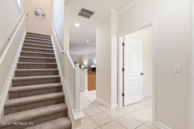 215 Bayberry Cir Unit 601, Saint Augustine, FL 32086 - staircase featuring tile patterned floors, ornamental molding, and recessed lighting