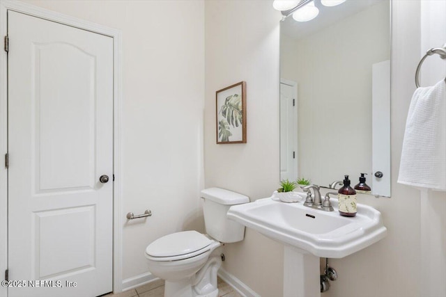 215 Bayberry Cir Unit 601, Saint Augustine, FL 32086 - half bath featuring toilet and tile patterned flooring