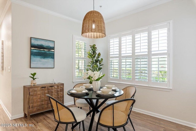 215 Bayberry Cir Unit 601, Saint Augustine, FL 32086 - dining area featuring wood finished floors, plenty of natural light, and ornamental molding
