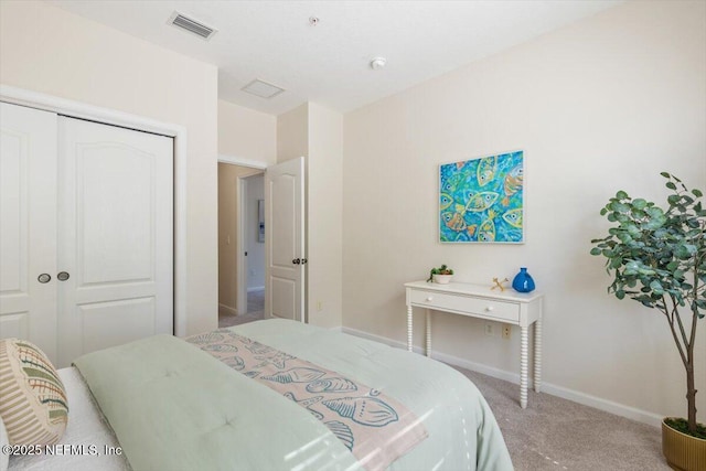 215 Bayberry Cir Unit 601, Saint Augustine, FL 32086 - carpeted bedroom featuring a closet and baseboards