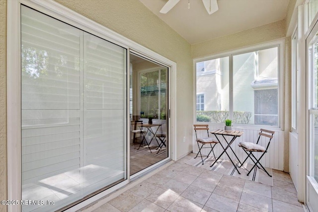 215 Bayberry Cir Unit 601, Saint Augustine, FL 32086 - sunroom / solarium featuring vaulted ceiling and a textured wall