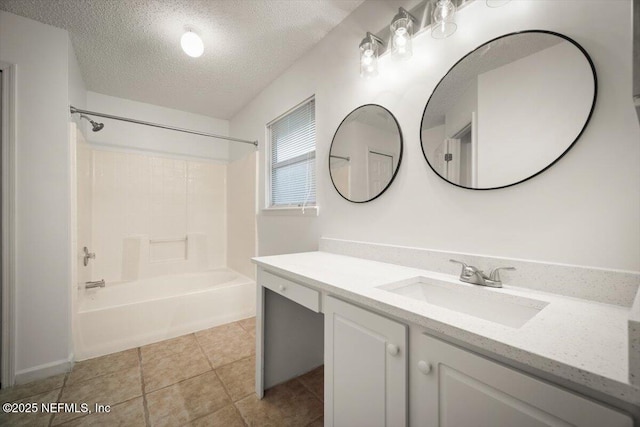 268 Southlake Dr, Saint Augustine, FL 32092 - full bathroom featuring washtub / shower combination, vanity, a textured ceiling, and tile patterned flooring
