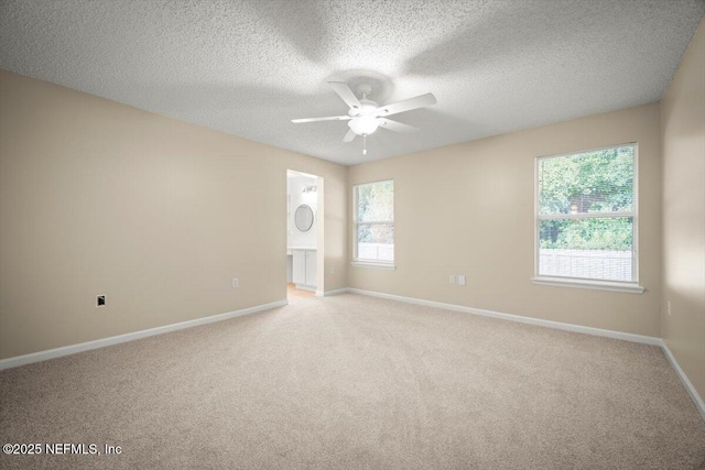 268 Southlake Dr, Saint Augustine, FL 32092 - unfurnished room with a ceiling fan, light carpet, and a textured ceiling