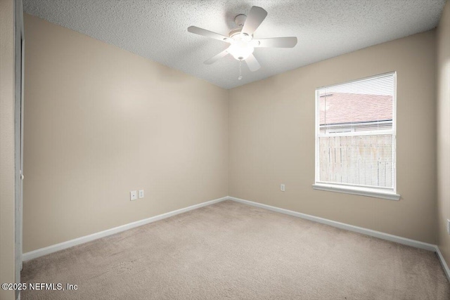 268 Southlake Dr, Saint Augustine, FL 32092 - spare room with light carpet, a ceiling fan, and a textured ceiling