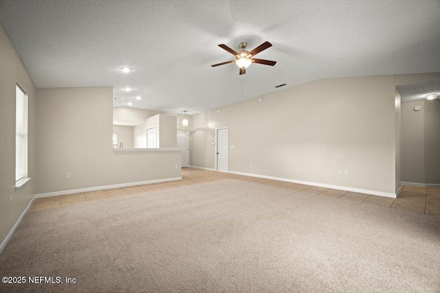 268 Southlake Dr, Saint Augustine, FL 32092 - empty room featuring light colored carpet, a ceiling fan, a textured ceiling, vaulted ceiling, and recessed lighting