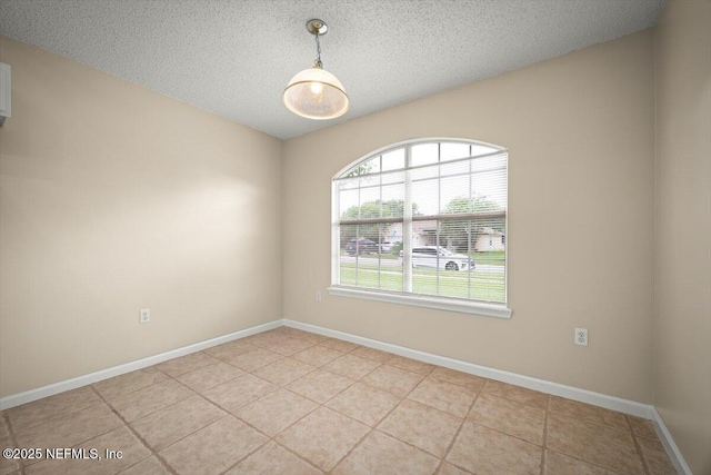 268 Southlake Dr, Saint Augustine, FL 32092 - spare room featuring a textured ceiling and light tile patterned floors