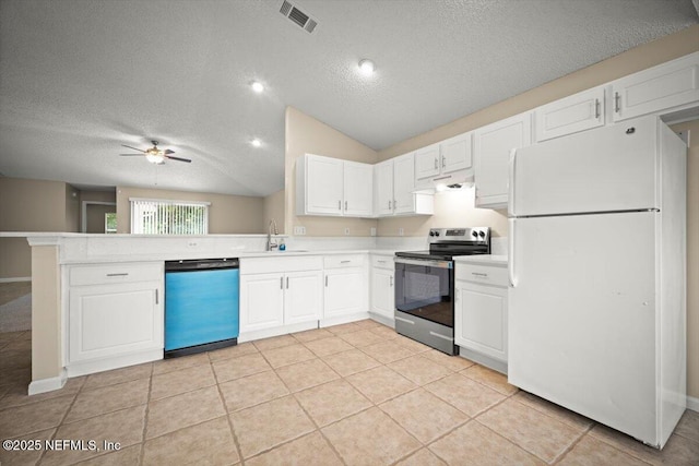 268 Southlake Dr, Saint Augustine, FL 32092 - kitchen with freestanding refrigerator, dishwashing machine, stainless steel electric range, a textured ceiling, and a ceiling fan