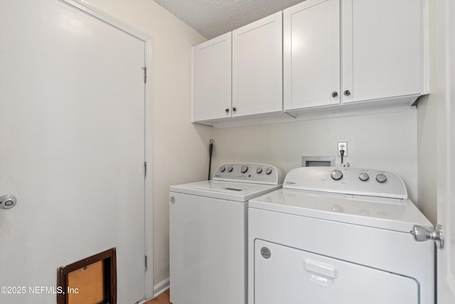 1578 Linkside Dr, Atlantic Beach, FL 32233 - laundry area featuring cabinet space, independent washer and dryer, and a textured ceiling