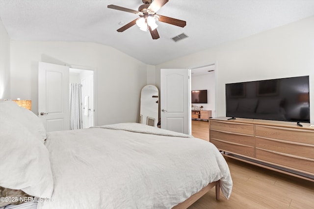 1578 Linkside Dr, Atlantic Beach, FL 32233 - bedroom featuring lofted ceiling, wood finished floors, a ceiling fan, and connected bathroom