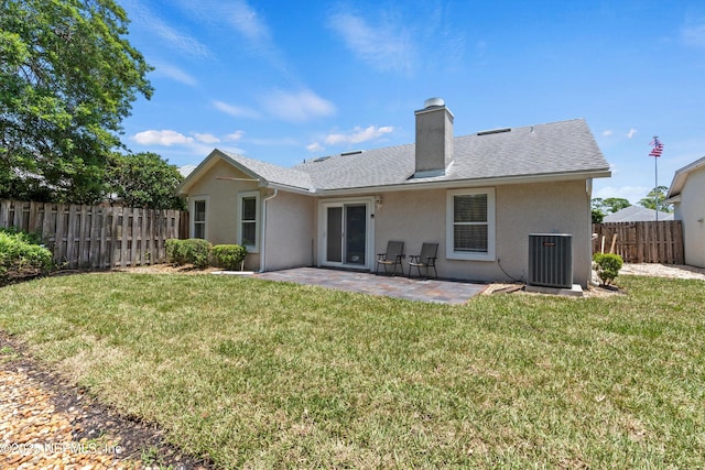 1578 Linkside Dr, Atlantic Beach, FL 32233 - back of property featuring stucco siding, a patio, and a chimney