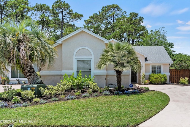 1578 Linkside Dr, Atlantic Beach, FL 32233 - view of front facade with stucco siding and driveway