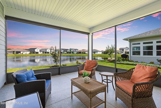 7 Los Lagos Blvd, Palm Coast, FL 32137 - sunroom / solarium with a residential view, a water view, and an outdoor hangout area