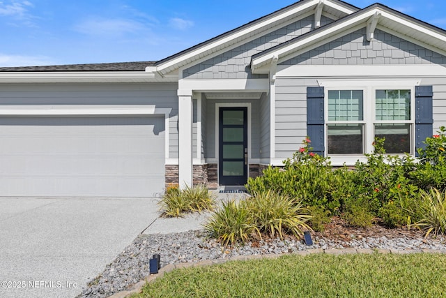 7 Los Lagos Blvd, Palm Coast, FL 32137 - doorway to property featuring driveway, a garage, and stone siding
