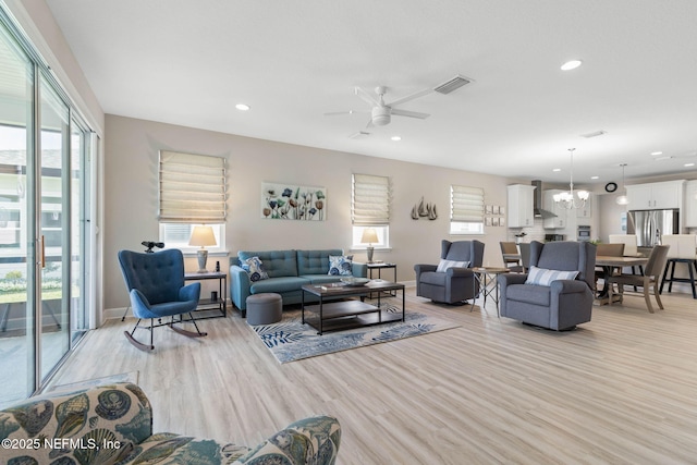 7 Los Lagos Blvd, Palm Coast, FL 32137 - living room with light wood-style flooring, recessed lighting, plenty of natural light, and ceiling fan