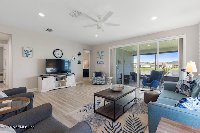 7 Los Lagos Blvd, Palm Coast, FL 32137 - living room featuring light wood finished floors, a ceiling fan, and recessed lighting