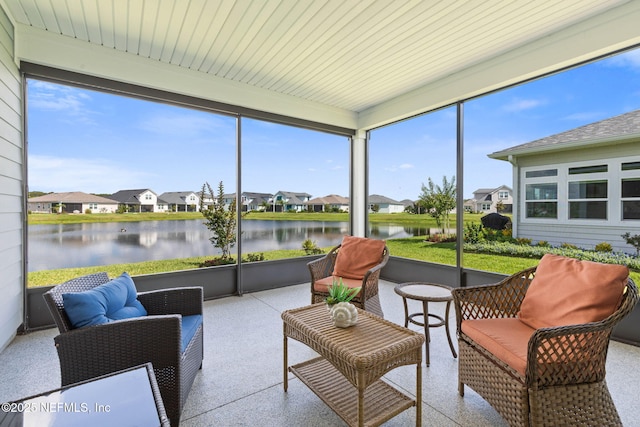 7 Los Lagos Blvd, Palm Coast, FL 32137 - sunroom with a residential view, healthy amount of natural light, a water view, and an outdoor living space