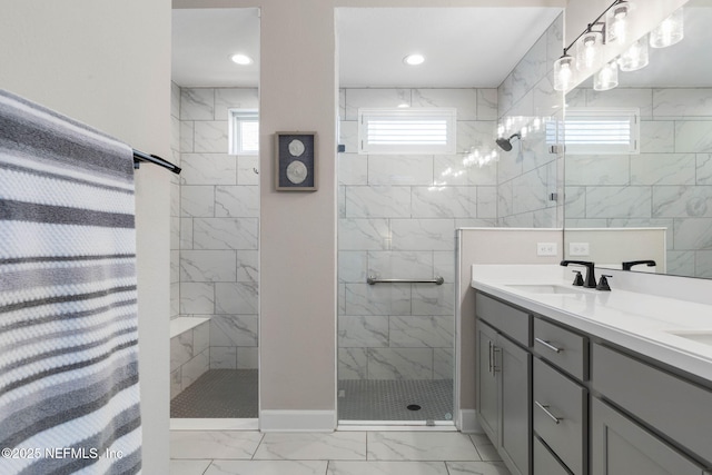 7 Los Lagos Blvd, Palm Coast, FL 32137 - full bath featuring marble finish floors, plenty of natural light, walk in shower, double vanity, and recessed lighting