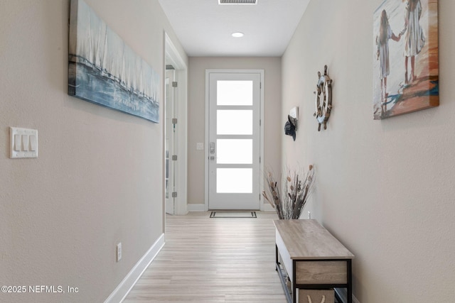7 Los Lagos Blvd, Palm Coast, FL 32137 - entryway featuring wood finished floors and baseboards