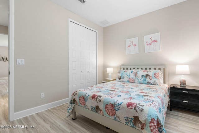 7 Los Lagos Blvd, Palm Coast, FL 32137 - bedroom with wood finished floors and a closet